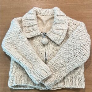 Handmade 100% wool cropped zip up sweater with pompom detail